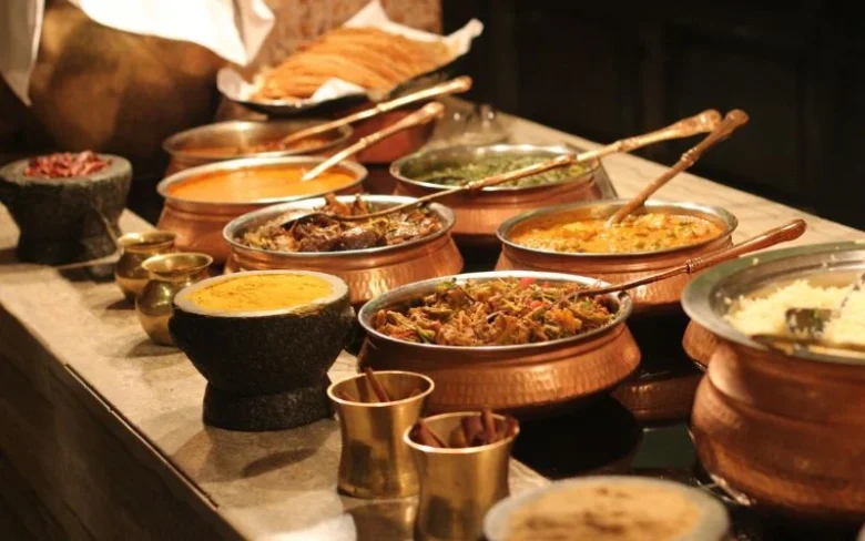 Selection of traditional French dishes in copper pots, ideal for wine pairing at La Maison Dublin