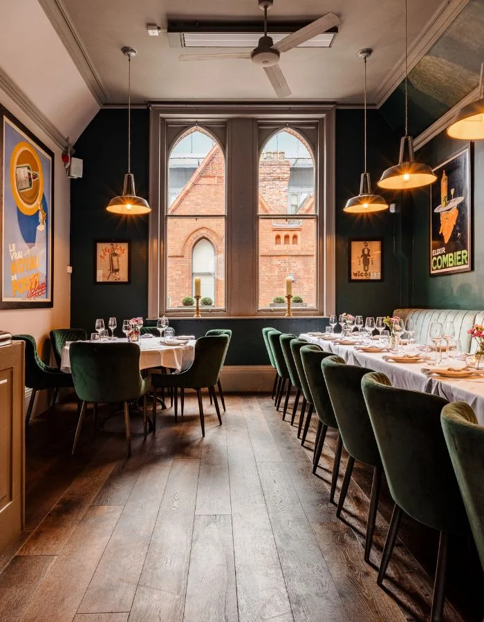 Elegant private dining room at La Maison in Dublin with natural light and vintage decor